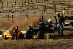 Max helping Paw Paw feed Dusty.